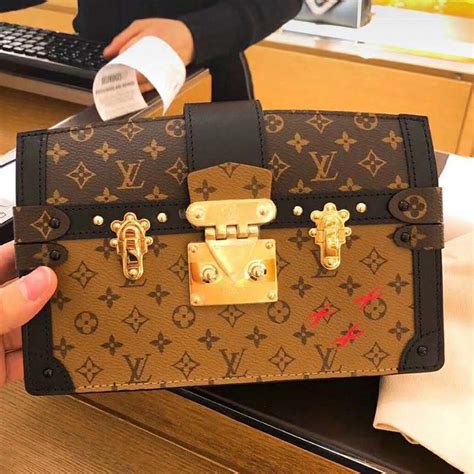 lv soft trunk clutch|louis vuitton box clutch.